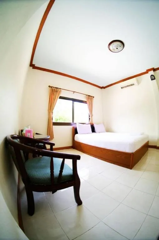 Bed in TAWANCHAY HOTEL PHATTHALUNG
