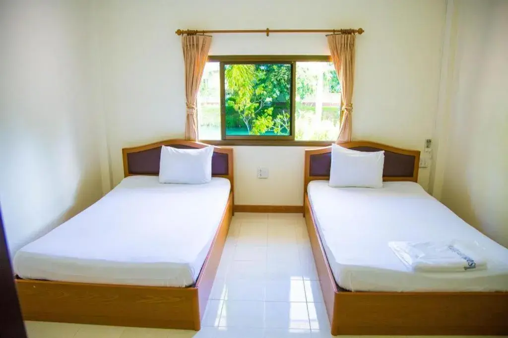 Bed in TAWANCHAY HOTEL PHATTHALUNG Bed in TAWANCHAY HOTEL PHATTHALUNG