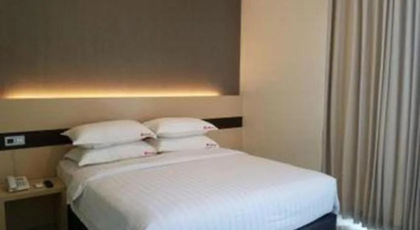 Bed in Sumi Hotel Surabaya