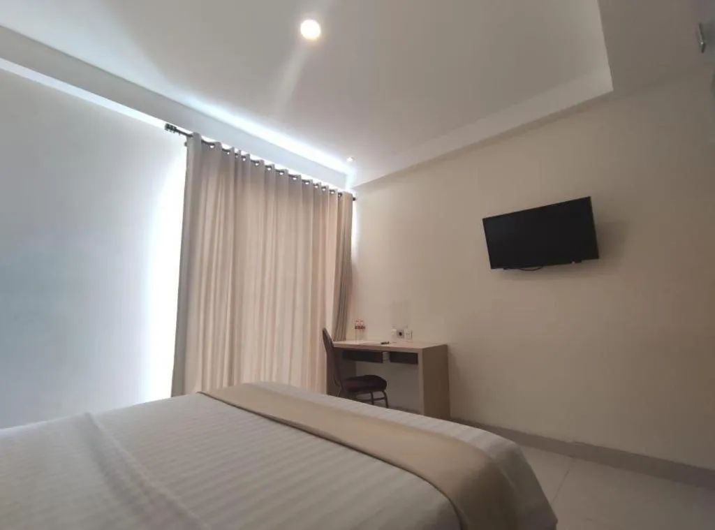 Bed in Sumi Hotel Surabaya