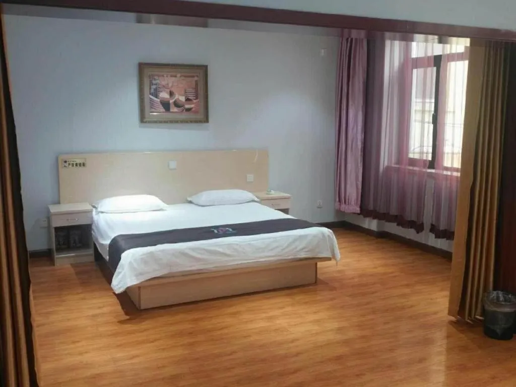 Bed in Pai Hotel Tianjin Binguan Metro Station Municipal Government