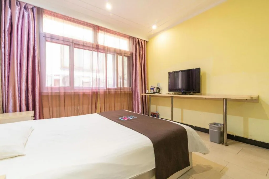 Bed in Pai Hotel Tianjin Binguan Metro Station Municipal Government