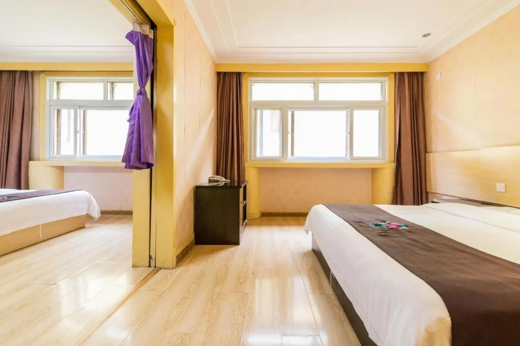 Bed in Pai Hotel Tianjin Binguan Metro Station Municipal Government