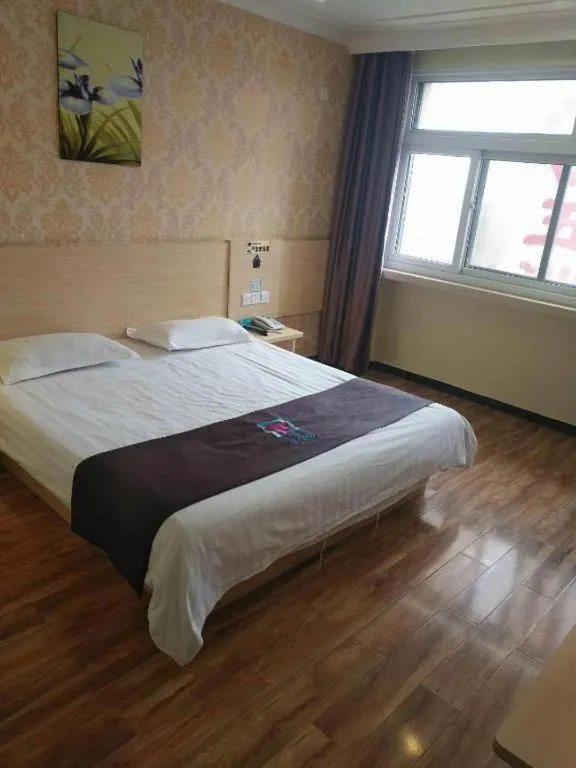 Bed in Pai Hotel Tianjin Binguan Metro Station Municipal Government