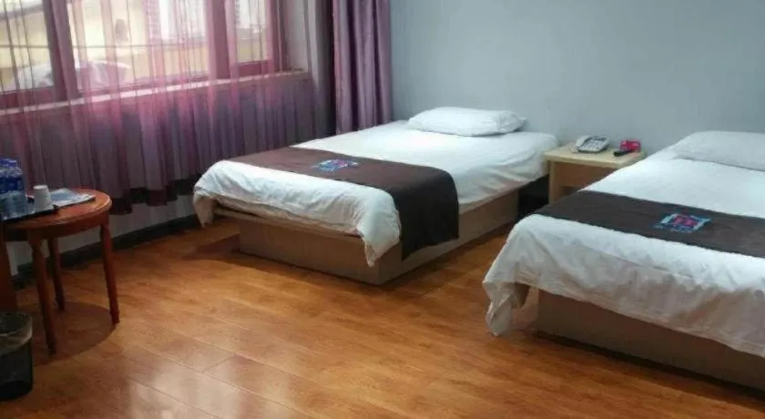 Bed in Pai Hotel Tianjin Binguan Metro Station Municipal Government