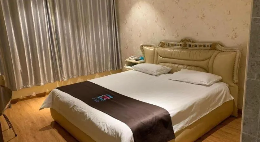Bed in Pai Hotel Tianjin Binguan Metro Station Municipal Government