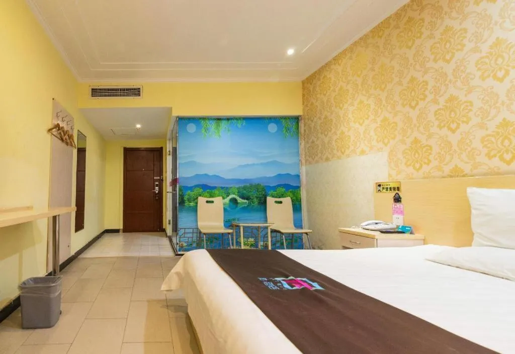 Bed in Pai Hotel Tianjin Binguan Metro Station Municipal Government