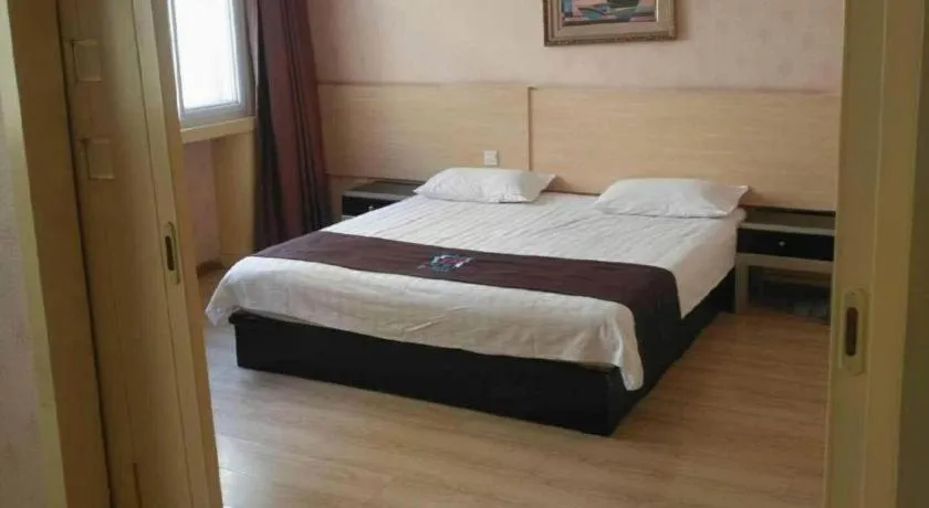 Bed in Pai Hotel Tianjin Binguan Metro Station Municipal Government