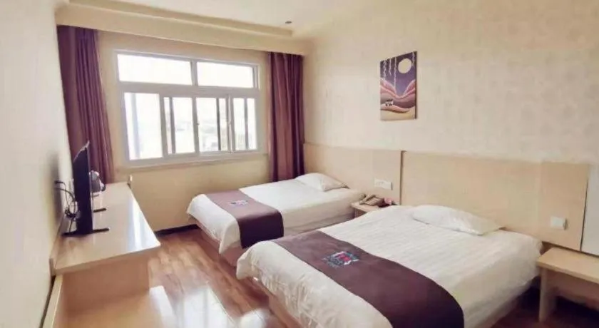 Bed in Pai Hotel Tianjin Binguan Metro Station Municipal Government