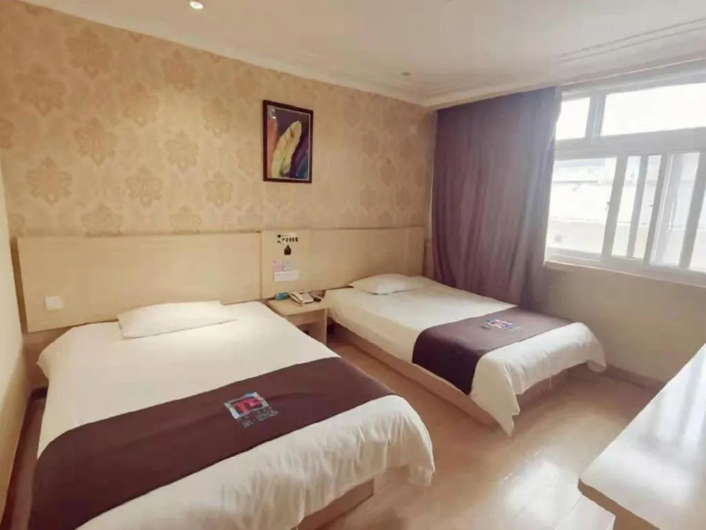 Bed in Pai Hotel Tianjin Binguan Metro Station Municipal Government