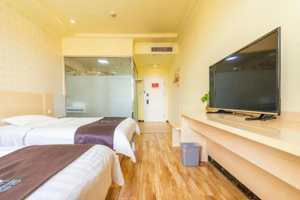 Bed in Pai Hotel Tianjin Binguan Metro Station Municipal Government