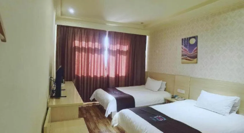 Bed in Pai Hotel Tianjin Binguan Metro Station Municipal Government