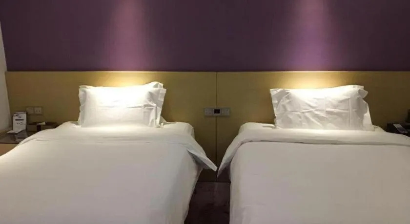 Bed in Lavande Hotel Beijing Olympic Village bird nest