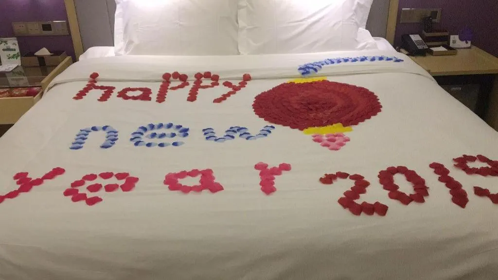 Bed in Lavande Hotel Beijing Olympic Village bird nest