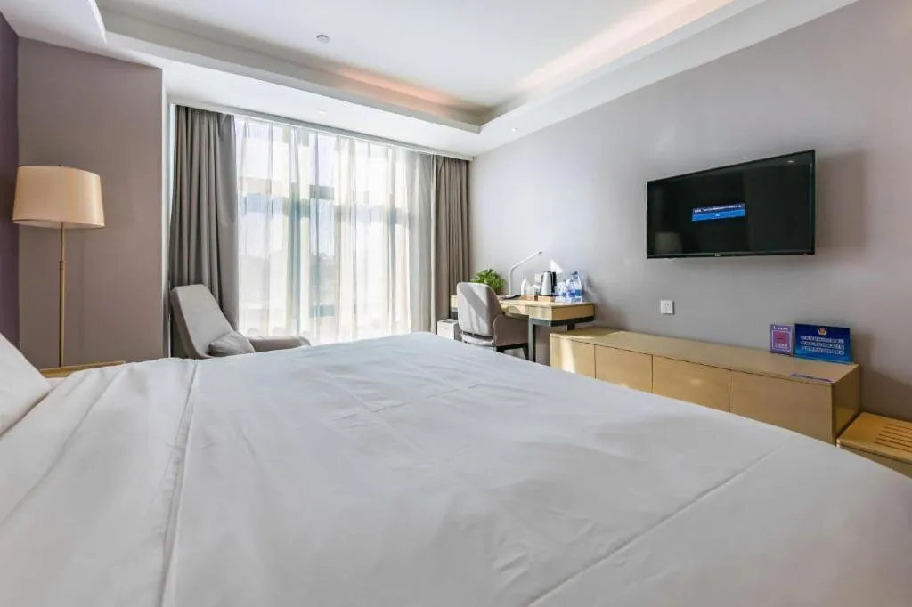 Bed in Lavande Hotel Beijing Olympic Village bird nest