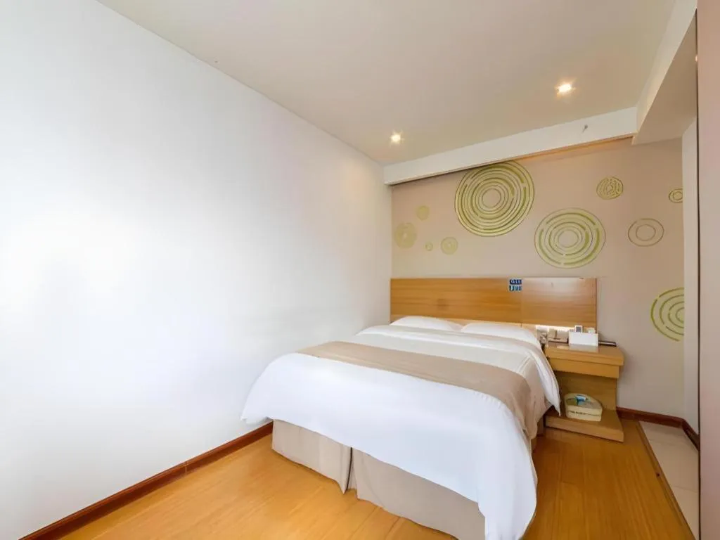 Bed in GreenTree Inn Xuancheng Jingxian Wannan First Street Express Hotel