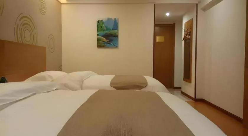 Bed in GreenTree Inn Xuancheng Jingxian Wannan First Street Express Hotel
