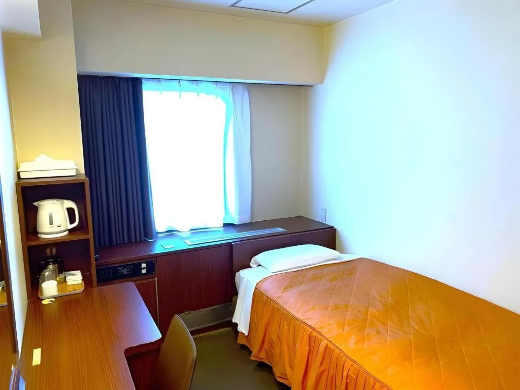 Bed in Hotel Suncity Ikebukuro