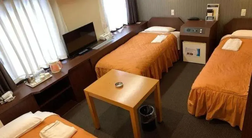 Bed in Hotel Suncity Ikebukuro Bed in Hotel Suncity Ikebukuro