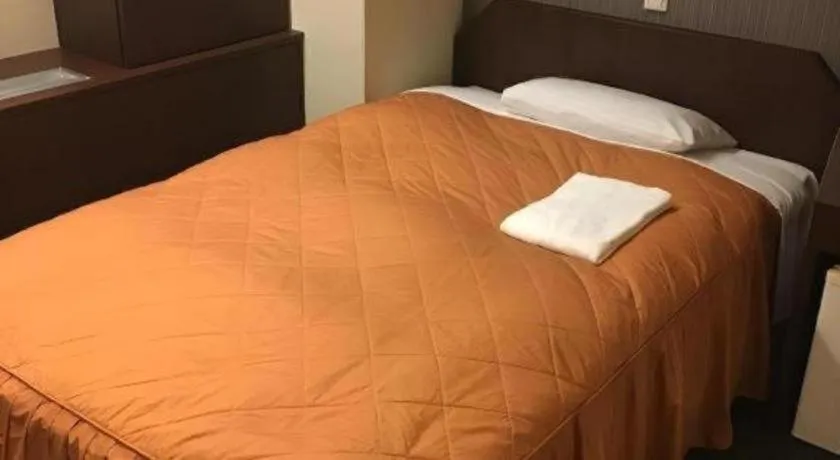 Bed in Hotel Suncity Ikebukuro