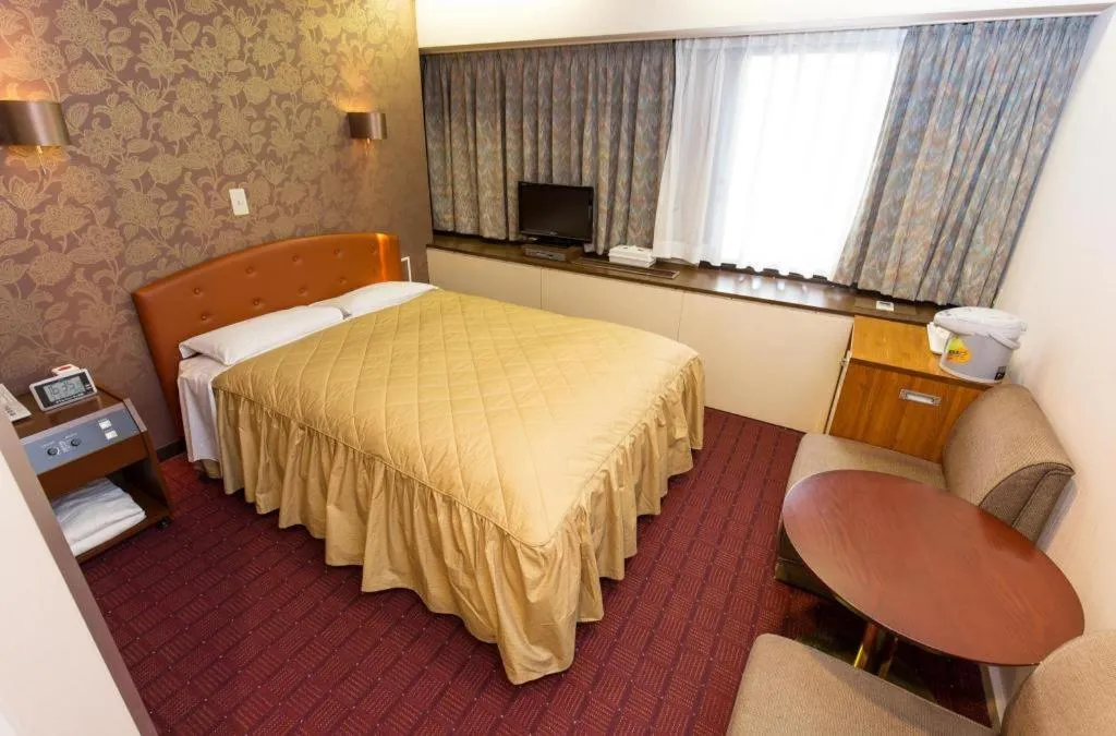 Bed in Hotel Suncity Ikebukuro