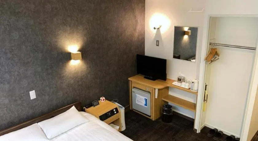 Bed in Hotel Suncity Ikebukuro