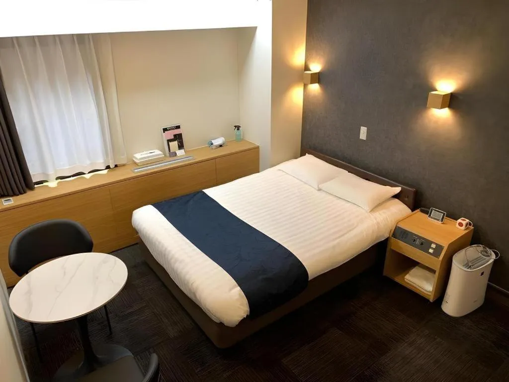 Bed in Hotel Suncity Ikebukuro