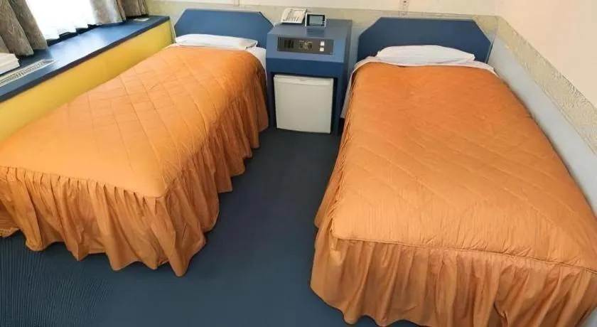 Bed in Hotel Suncity Ikebukuro