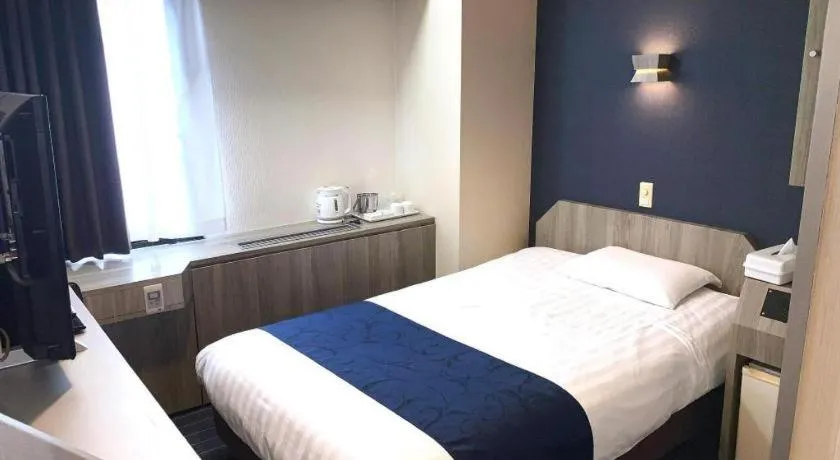 Bed in Hotel Suncity Ikebukuro