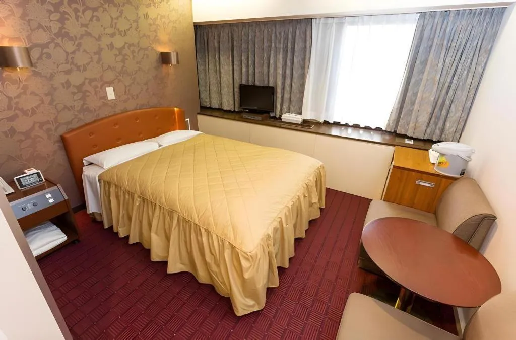 Bed in Hotel Suncity Ikebukuro