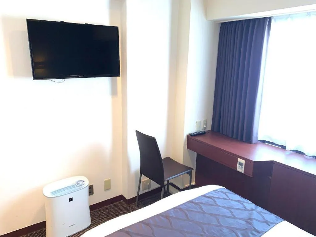 Bed in Hotel Suncity Ikebukuro