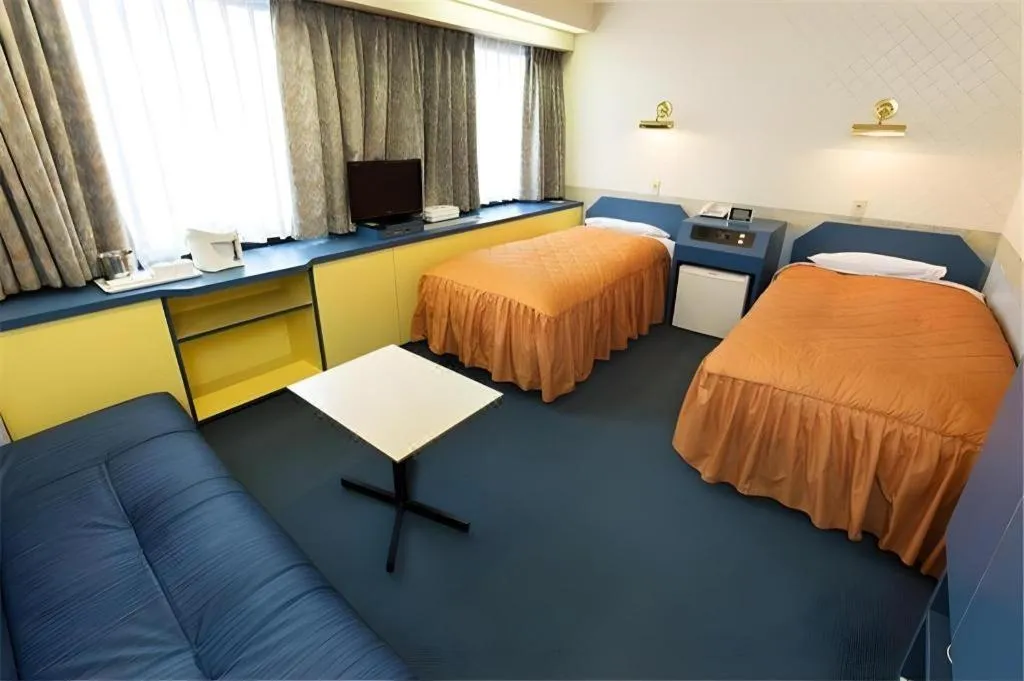 Bed in Hotel Suncity Ikebukuro