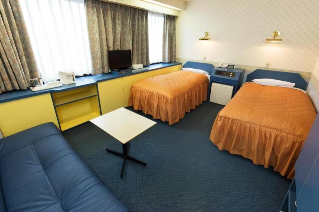 Bed in Hotel Suncity Ikebukuro