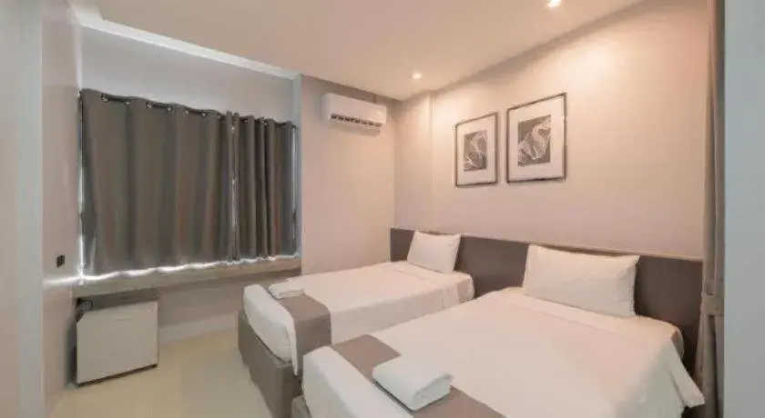 Bed in C2U Hotel Uthai Thani Bed in C2U Hotel Uthai Thani