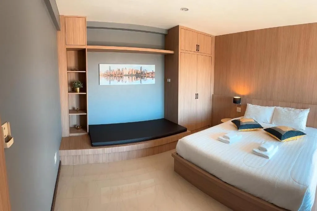 Bed in Home Place Lopburi Hotel