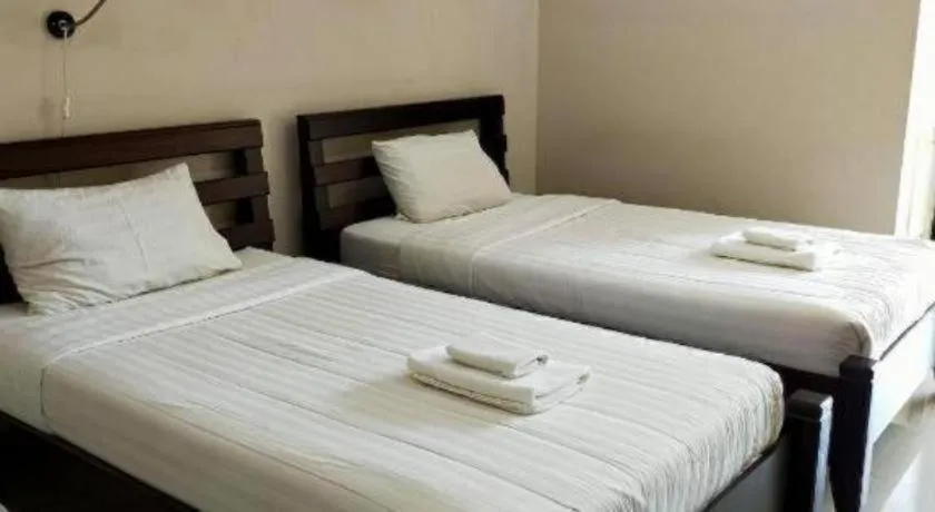 Bed in Home Place Lopburi Hotel