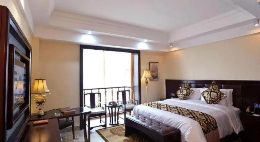 Bed in Wanjiale International Hotel