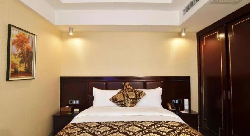 Bed in Wanjiale International Hotel