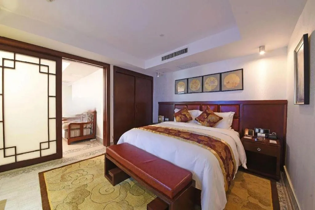 Bed in Wanjiale International Hotel