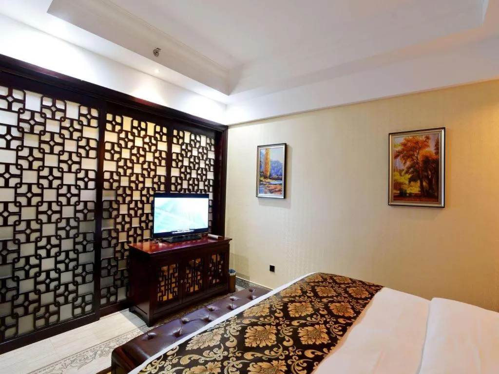 Bed in Wanjiale International Hotel