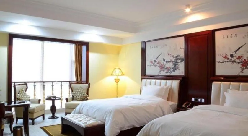 Bed in Wanjiale International Hotel