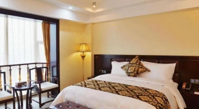 Bed in Wanjiale International Hotel