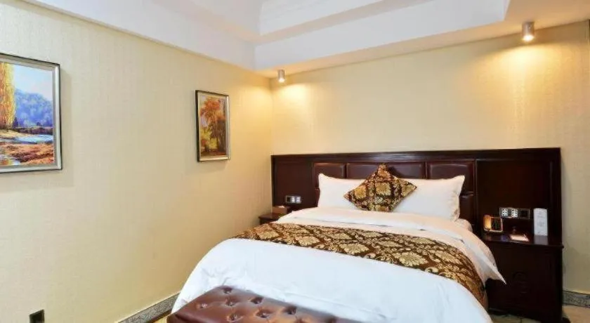 Bed in Wanjiale International Hotel