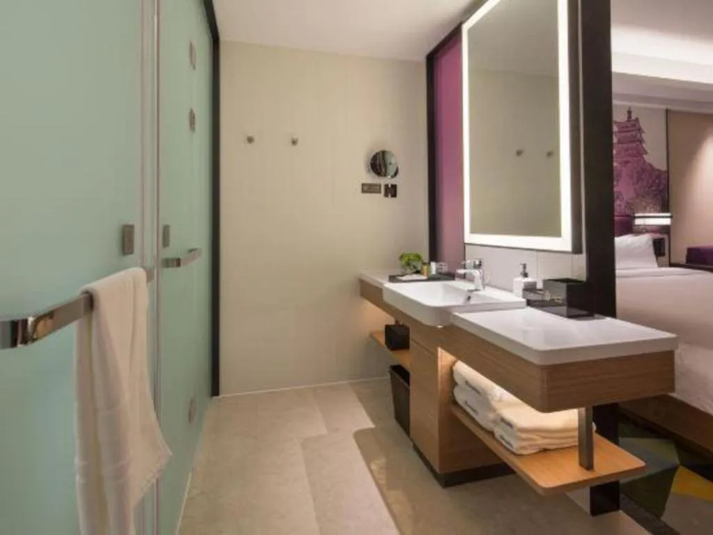 Bed in Hampton by Hilton Suzhou XiangCheng