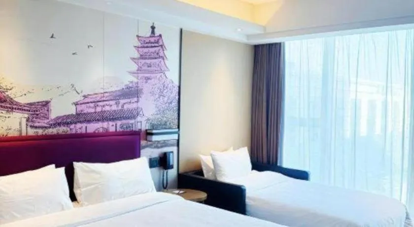 Bed in Hampton by Hilton Suzhou XiangCheng