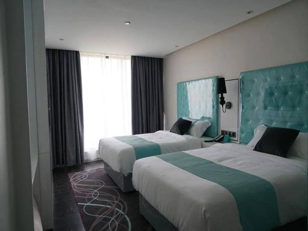 Bed in Xana Lite Zhanjiang Guanhai Corridor