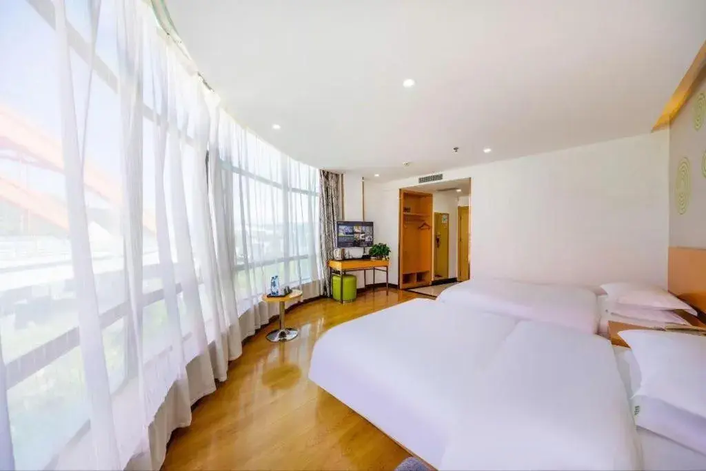 Bed in GreenTree Inn Linxia Niujinhe Avenue Express Hotel Bed in GreenTree Inn Linxia Niujinhe Avenue Express Hotel