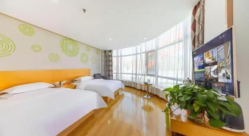 Bed in GreenTree Inn Linxia Niujinhe Avenue Express Hotel Bed in GreenTree Inn Linxia Niujinhe Avenue Express Hotel