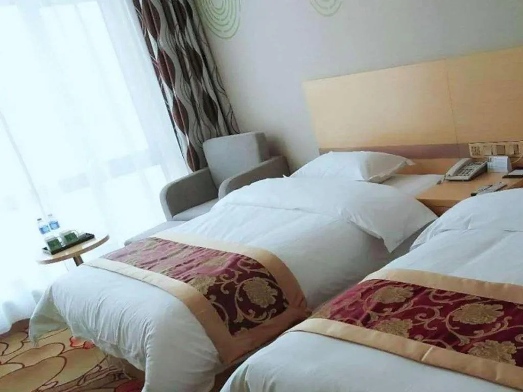 Bed in GreenTree Inn Linxia Niujinhe Avenue Express Hotel