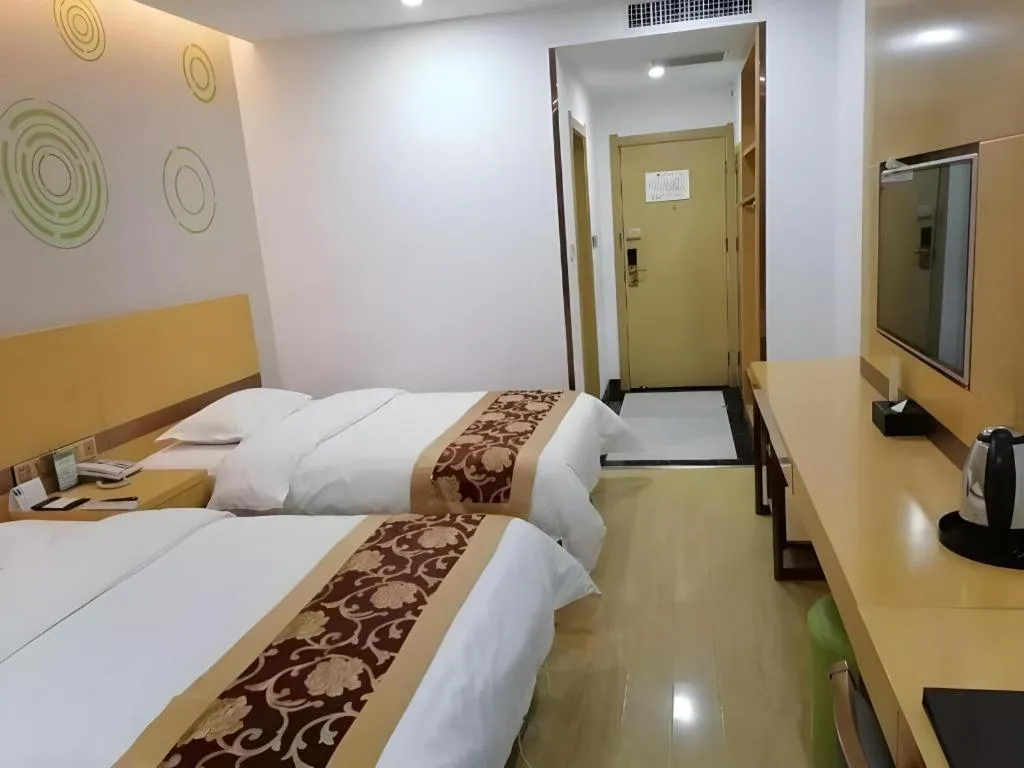 Bed in GreenTree Inn Linxia Niujinhe Avenue Express Hotel
